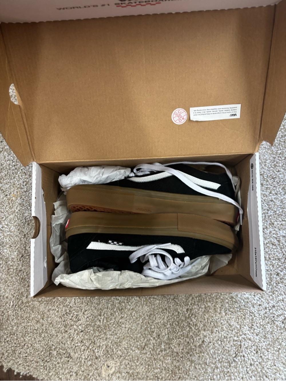 Vans Black Canvas Low-Top Sneakers with White Stripe and Gum Sole